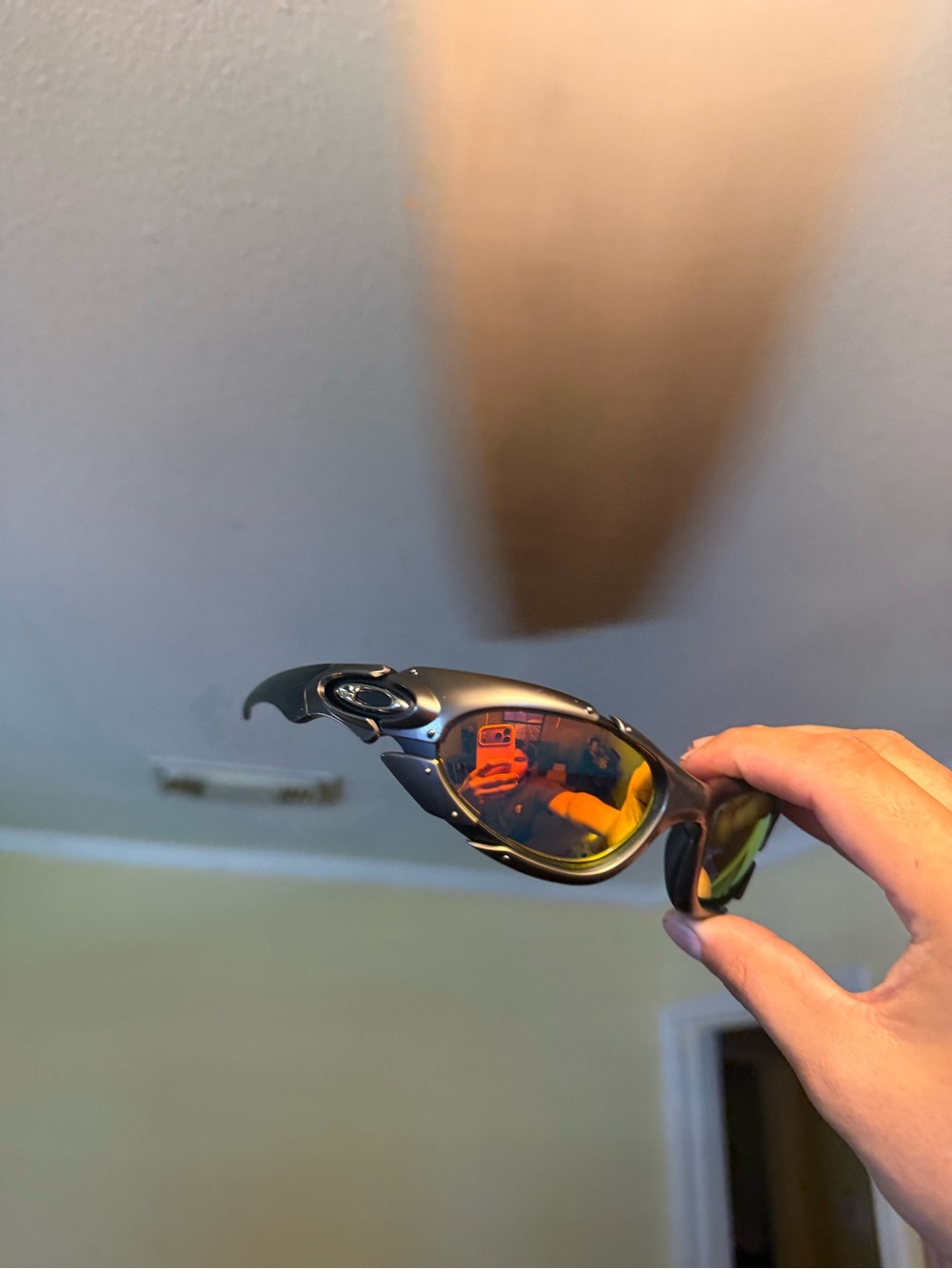 Oakley Sunglasses Black Frame with Orange Mirrored Lenses Oakleys
